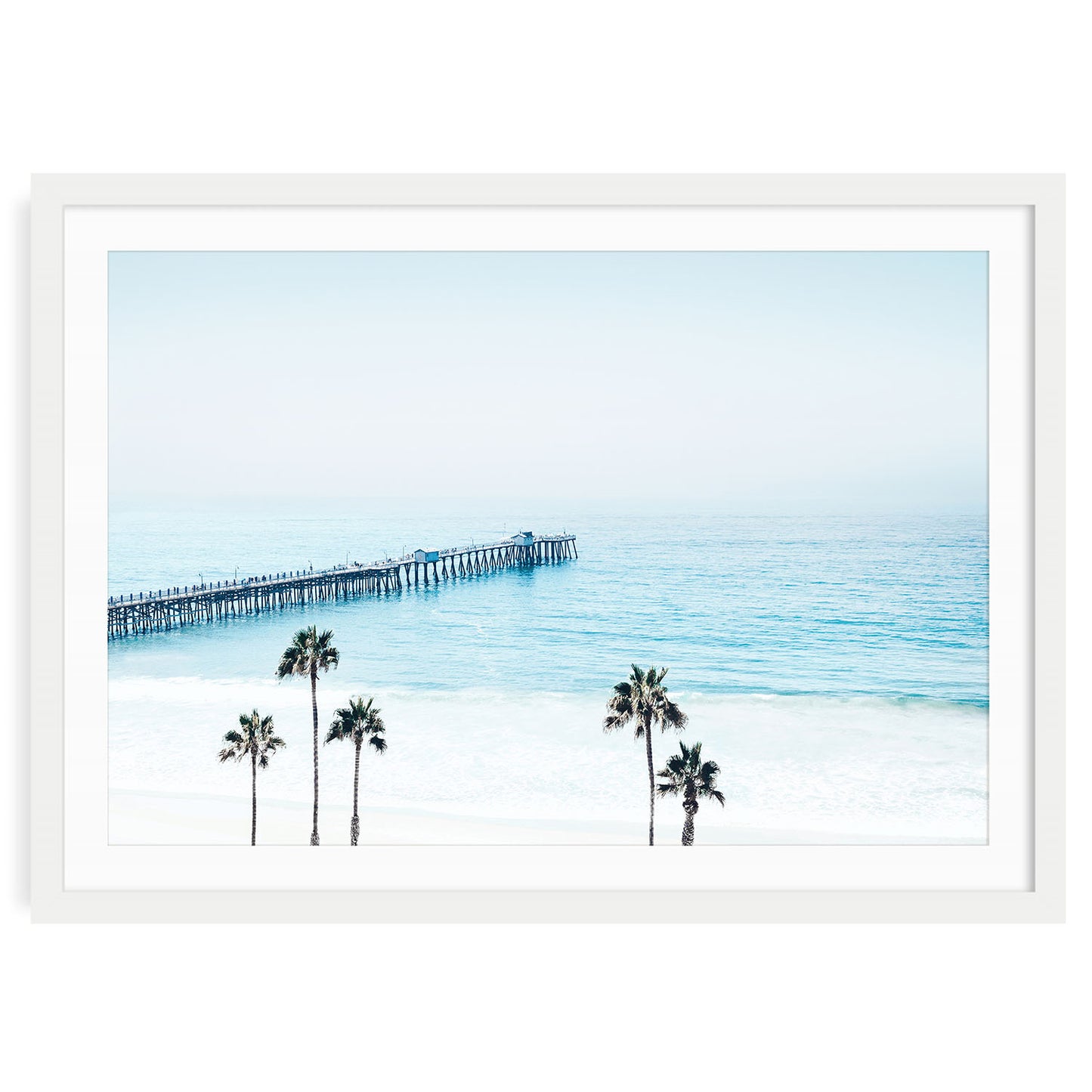 Coastal wall art featuring San Clemente Pier, soft blue ocean tones, and palm trees California beach photography for serene interiors.
