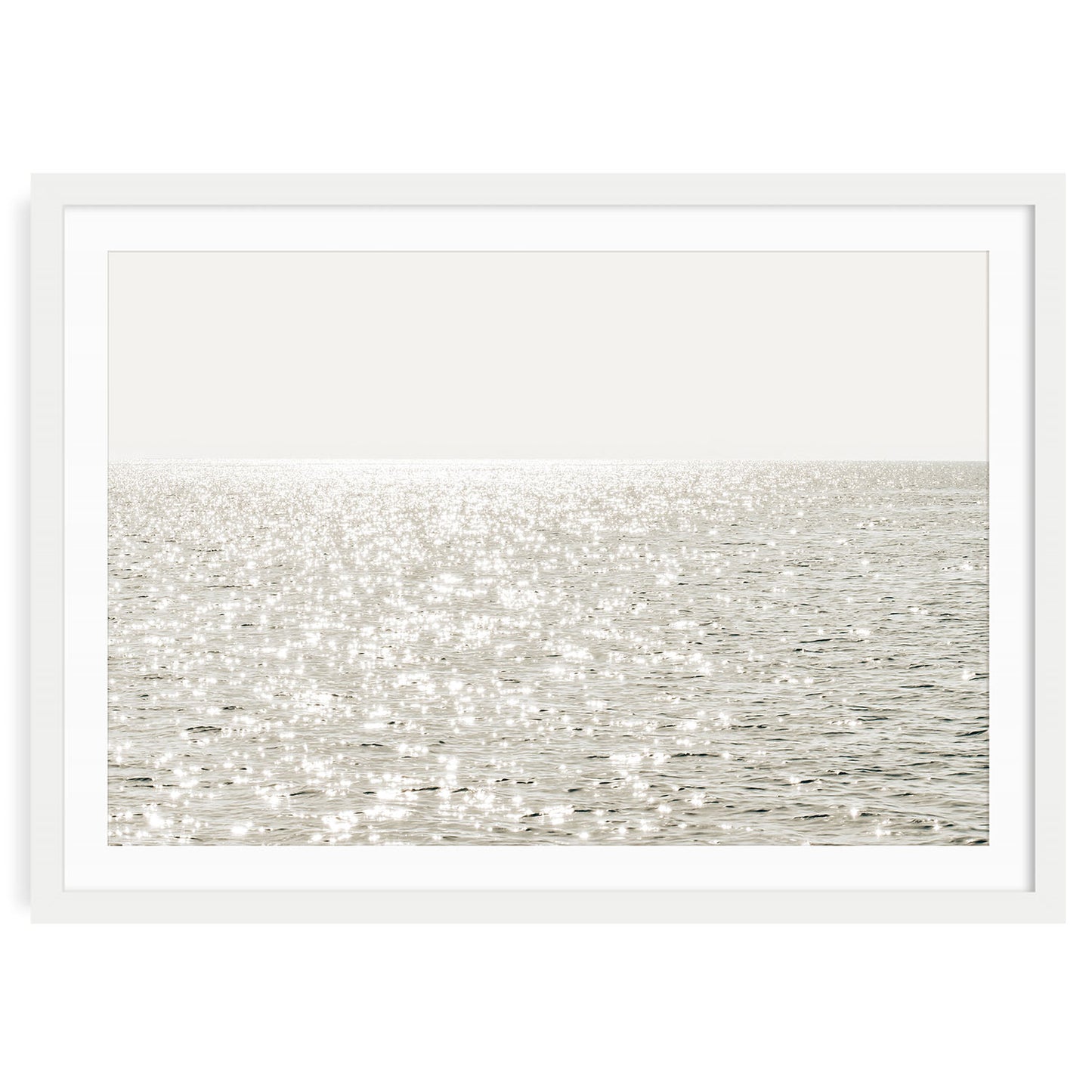 Minimalist coastal photo print featuring sparkling ocean waves under golden sunlight, capturing a serene beach scene in soft, modern tones.