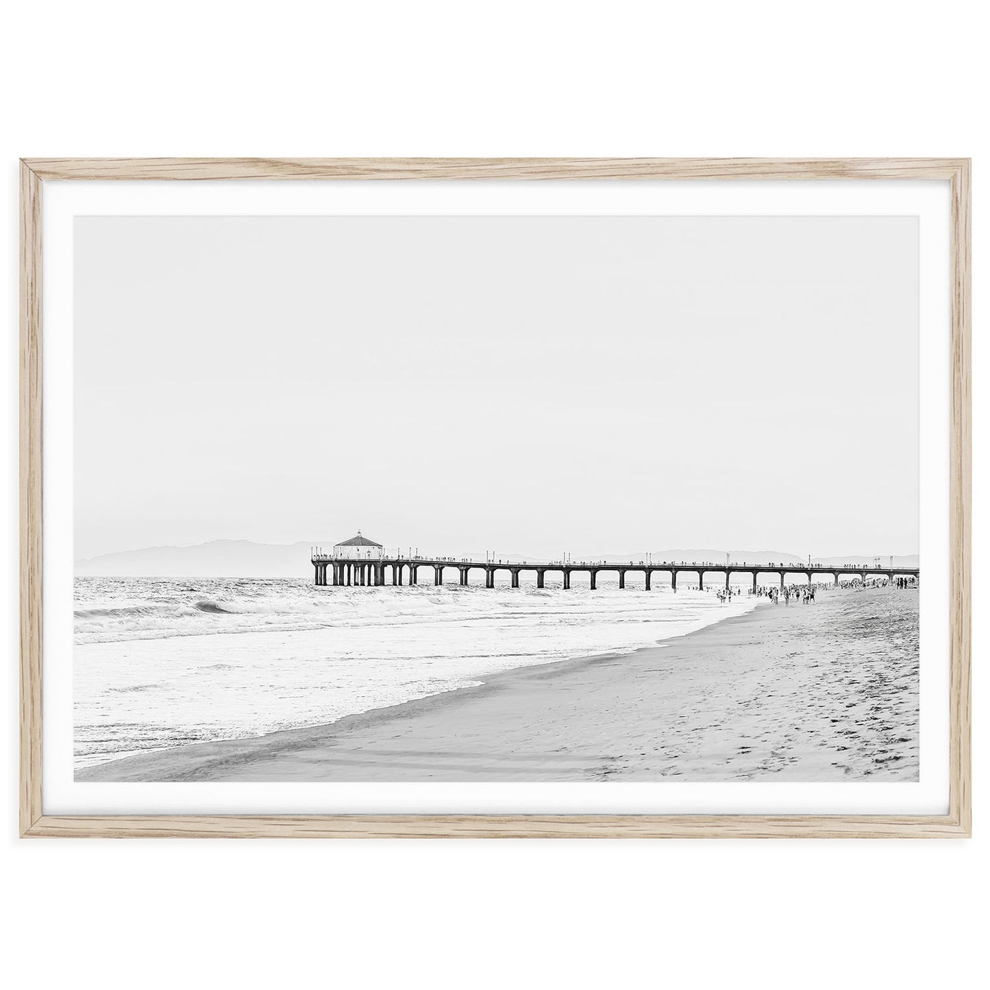Black and white fine art photograph of Manhattan Beach Pier with ocean waves and horizon, coastal photography wall art print for modern home or office decor