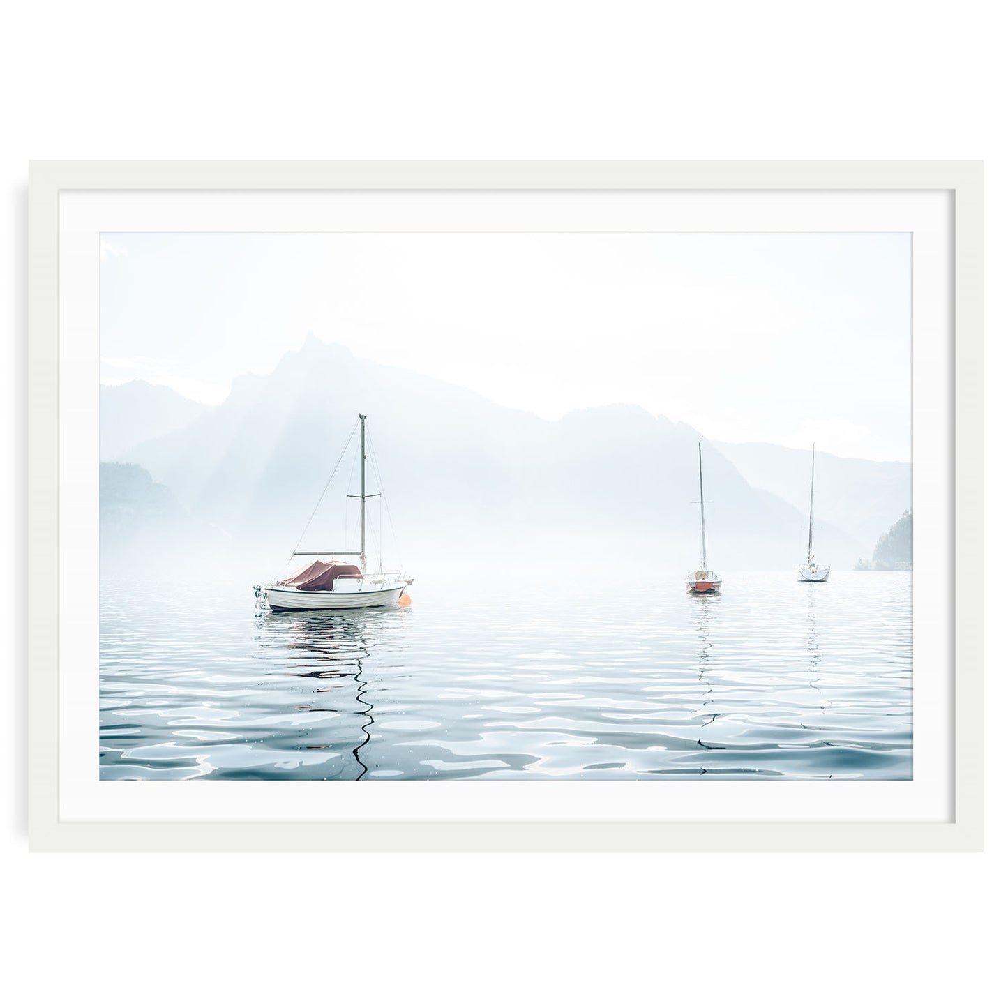 Minimalist nautical wall art featuring sailboats on a calm lake with pastel blue sky, perfect for coastal inspired or serene home decor themes.