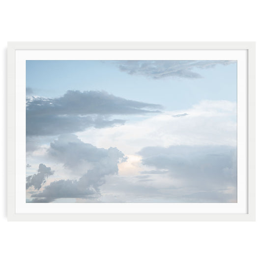 Soft blue stormy clouds sky fine art photography print showing dramatic textured clouds and moody atmospheric sky ideal for wall art and home decor