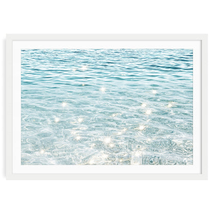 Sparkling ocean water fine art print featuring sunlight reflections on gentle blue waves, perfect coastal wall art for beach-inspired home décor