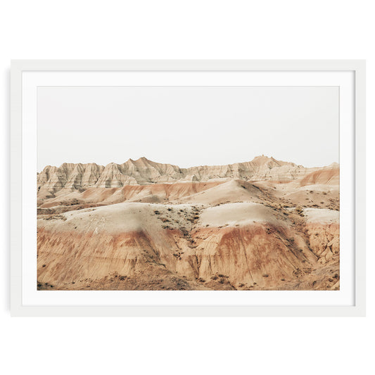 Badlands South Dakota fine art print showing rugged, layered rock formations in warm, neutral desert tones earthy minimalist wall art for modern home decor.