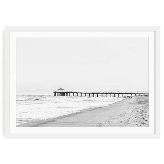 Black and white fine art photograph of Manhattan Beach Pier with ocean waves and horizon, coastal photography wall art print for modern home or office decor