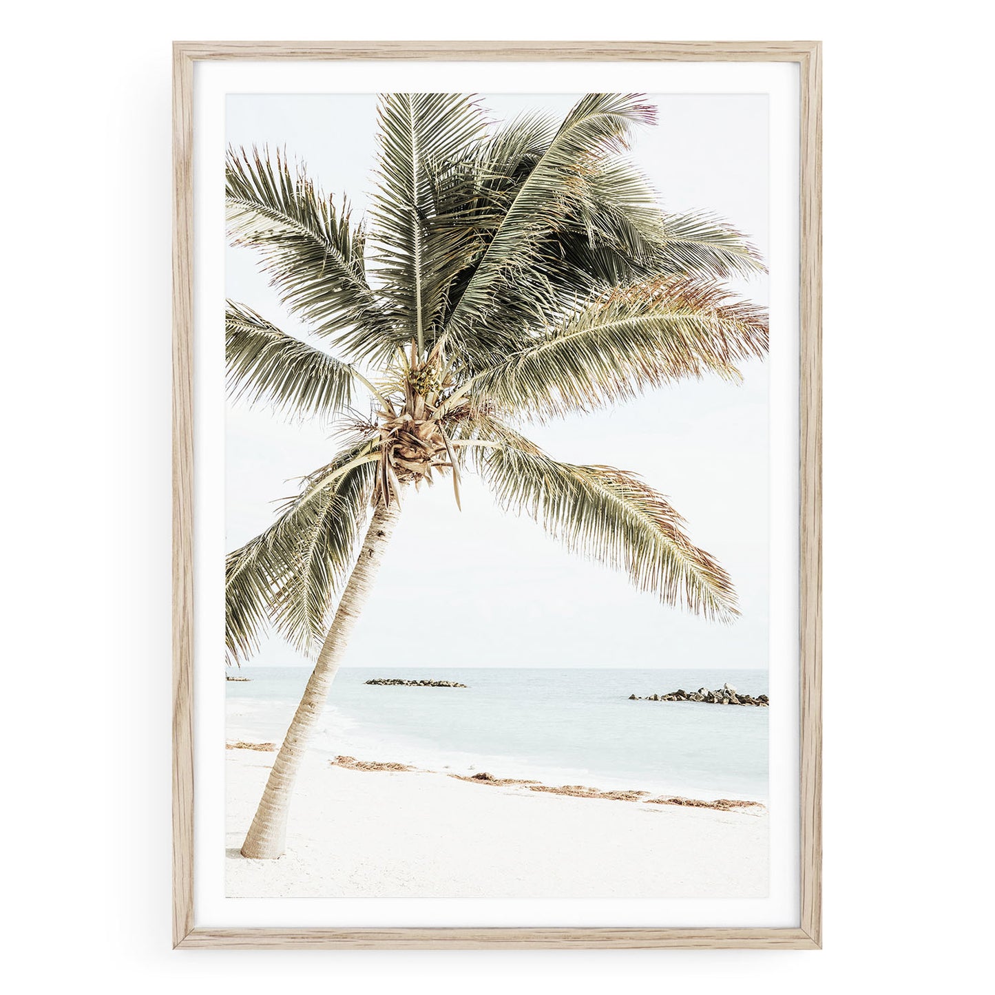 Tropical island palm tree wall art print with soft minimalist beach tones, perfect for resort-style and coastal home decor.