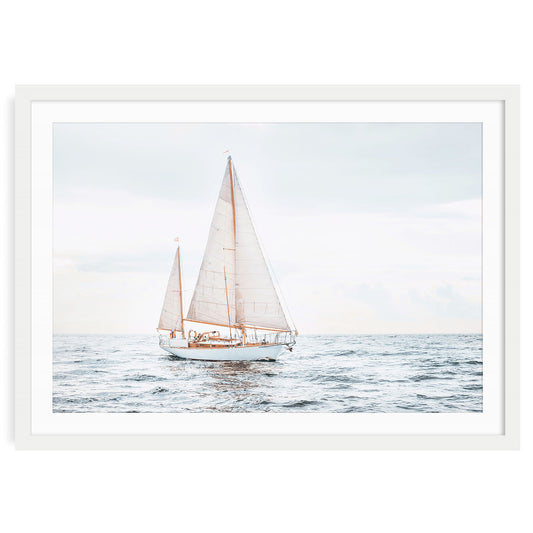 Oversized sailboat art print in modern wooden frame on plain background, minimalist coastal wall decor for beach or lake house.