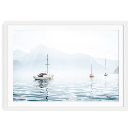 Minimalist nautical wall art featuring sailboats on a calm lake with pastel blue sky, perfect for coastal inspired or serene home decor themes.