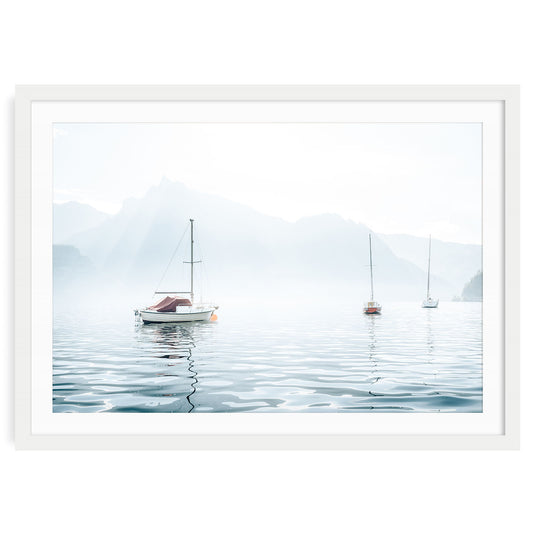 Minimalist nautical wall art featuring sailboats on a calm lake with pastel blue sky, perfect for coastal inspired or serene home decor themes.