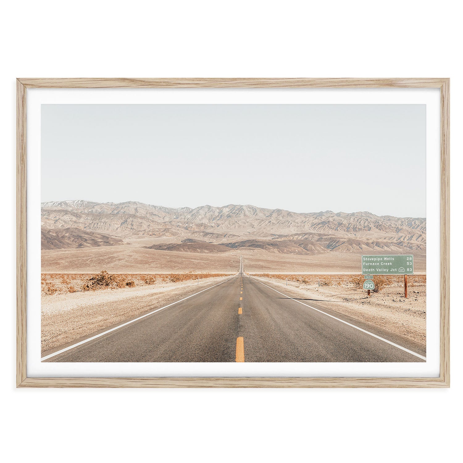 Framed California desert landscape print featuring soft beige sand dunes in Death Valley under a pale sky, styled as boho minimalist wall art for home decor