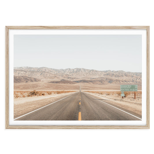 Framed California desert landscape print featuring soft beige sand dunes in Death Valley under a pale sky, styled as boho minimalist wall art for home decor