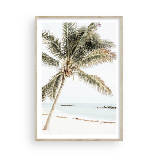 Tropical island palm tree wall art print with soft minimalist beach tones, perfect for resort-style and coastal home decor.