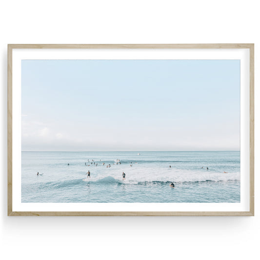Minimalist aerial surf print showing surfers on turquoise waves, captured from above — fine art beach photography for coastal or modern ocean decor.
