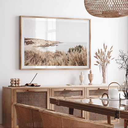 Neutral-toned Montaña de Oro ocean cliff print featuring muted beige coastal landscape, perfect for serene nature-inspired and minimalist California home decor.


