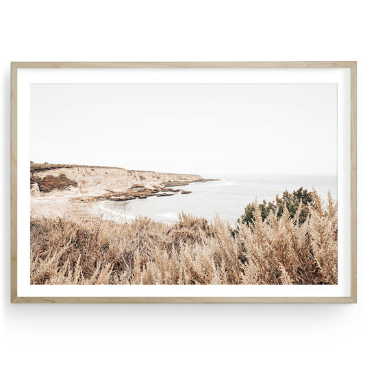 Neutral-toned Montaña de Oro ocean cliff print featuring muted beige coastal landscape, perfect for serene nature-inspired and minimalist California home decor.
